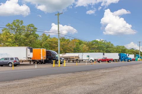 Equipment Parking — Two Middle Class Semi Trucks With Box Trailers in Sicklerville, NJ